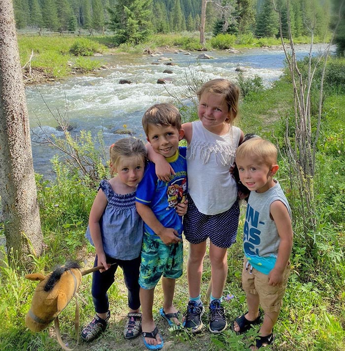 kids by creek